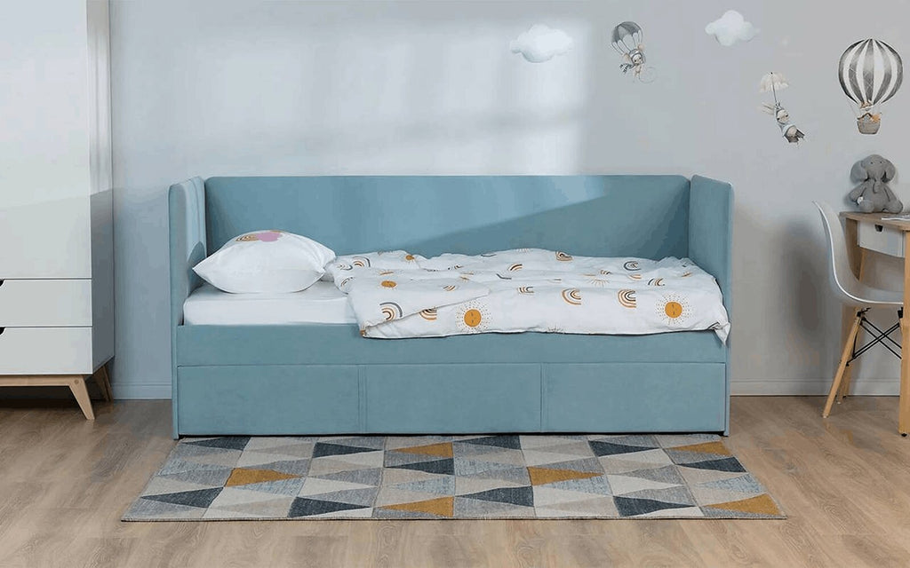 Uno Duo minimalist bed with soft headboards, extra sleeping space, in a cosy child's room