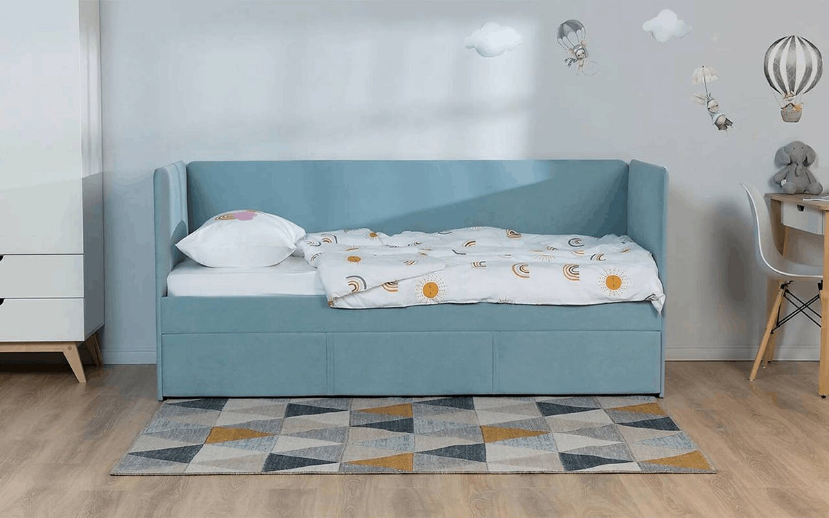 Uno Duo minimalist bed with soft headboards, extra sleeping space, in a cosy child's room
