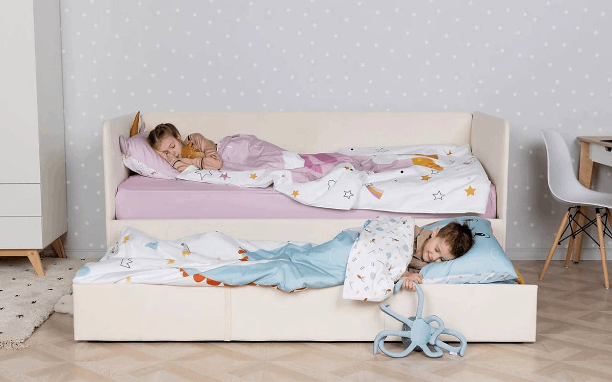 Uno Duo minimalist bunk bed with soft upholstered headboard in a cosy kids' room interior