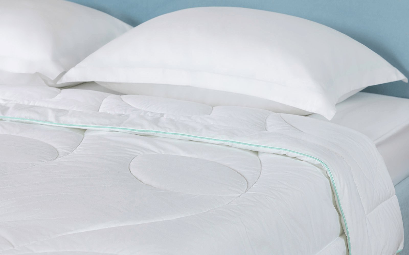 Freshly duvet in a bedroom interior, view 1