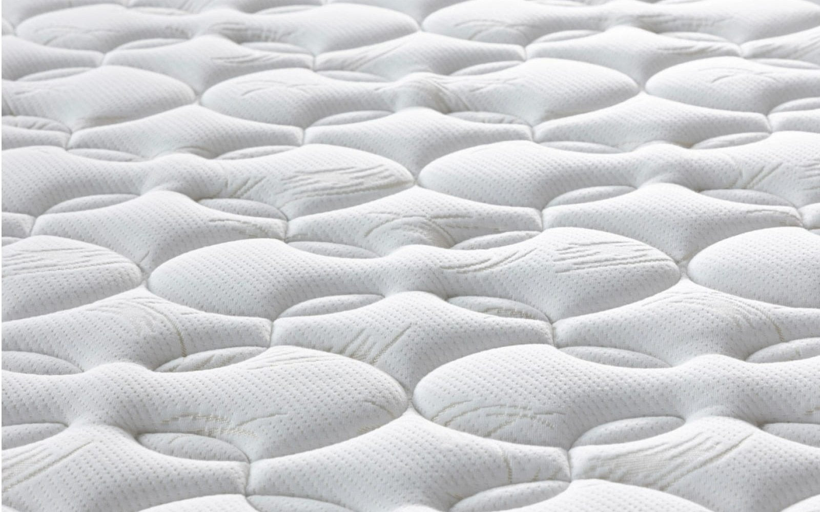 Family Comfort mattress in a bedroom interior, view 1