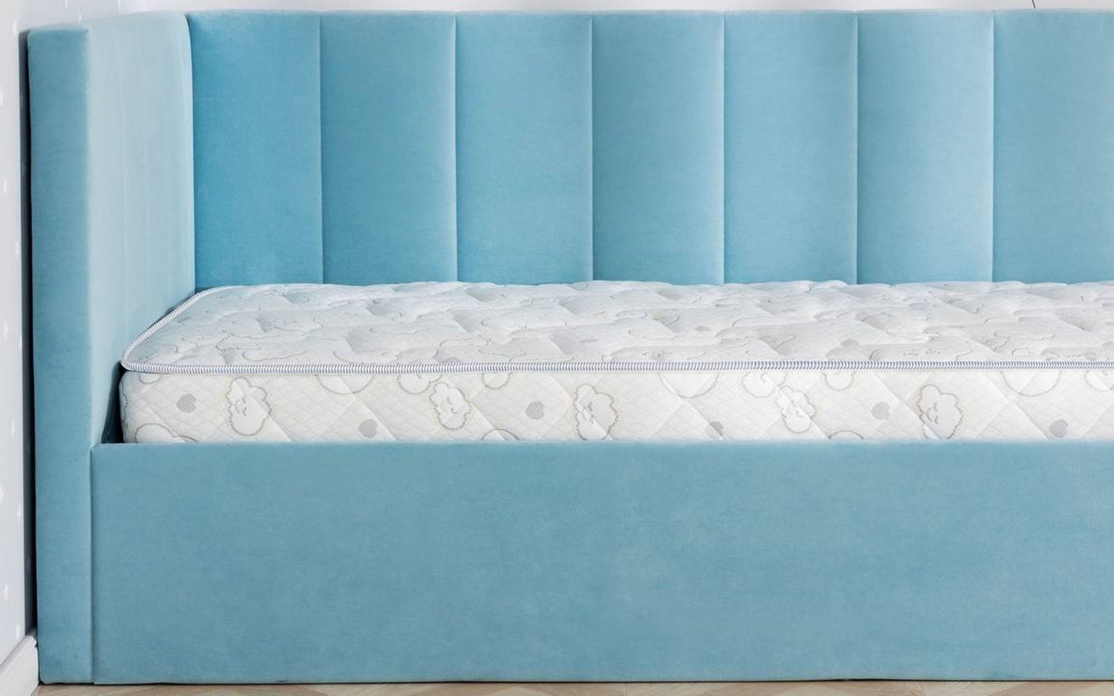 Kids Teeny mattress in a bedroom interior