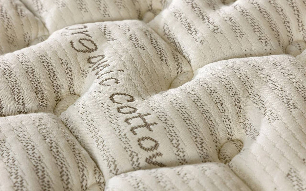 Organic Latex mattress pad in a bedroom interior, view 1