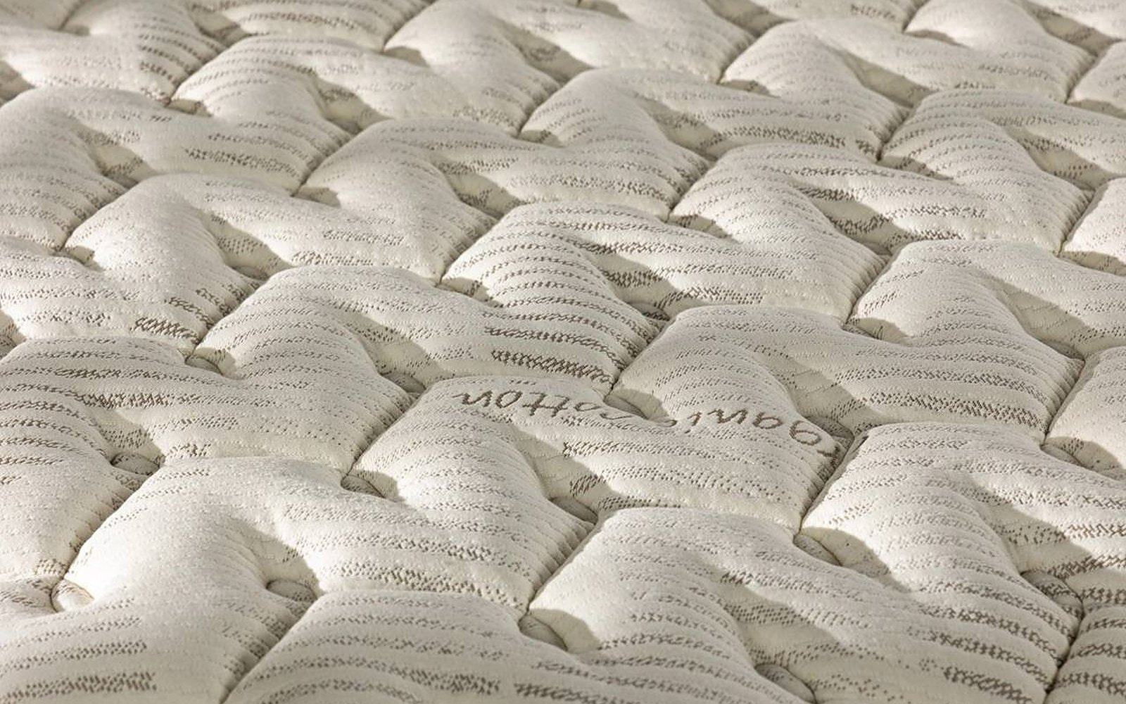 Organic Latex mattress pad in a bedroom interior, view 2