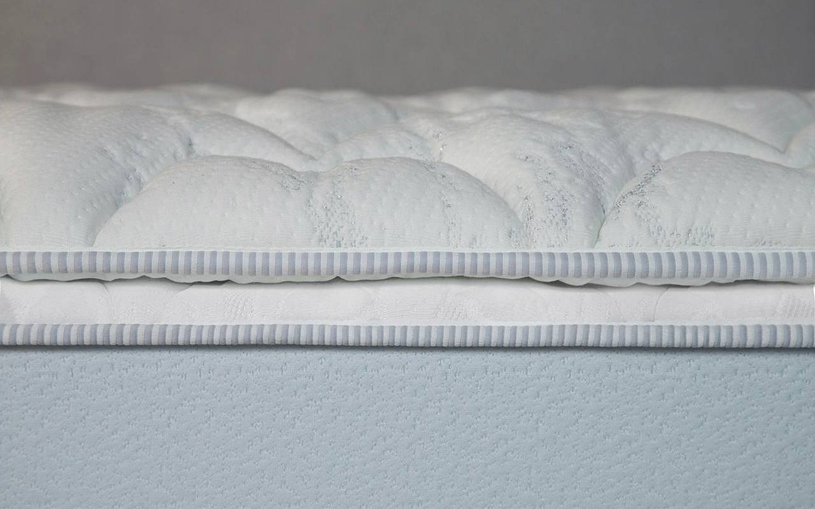 Sleep Professor mattress pad in a bedroom interior, view 1