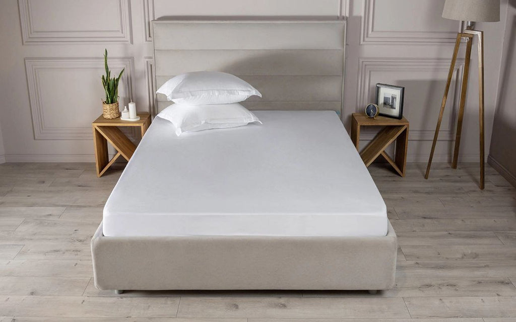 Simple mattress protector in a bedroom interior, view 2