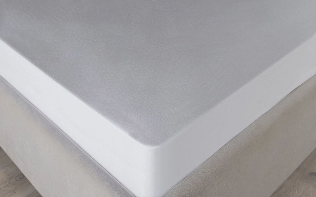 Simple mattress protector in a bedroom interior, view 3