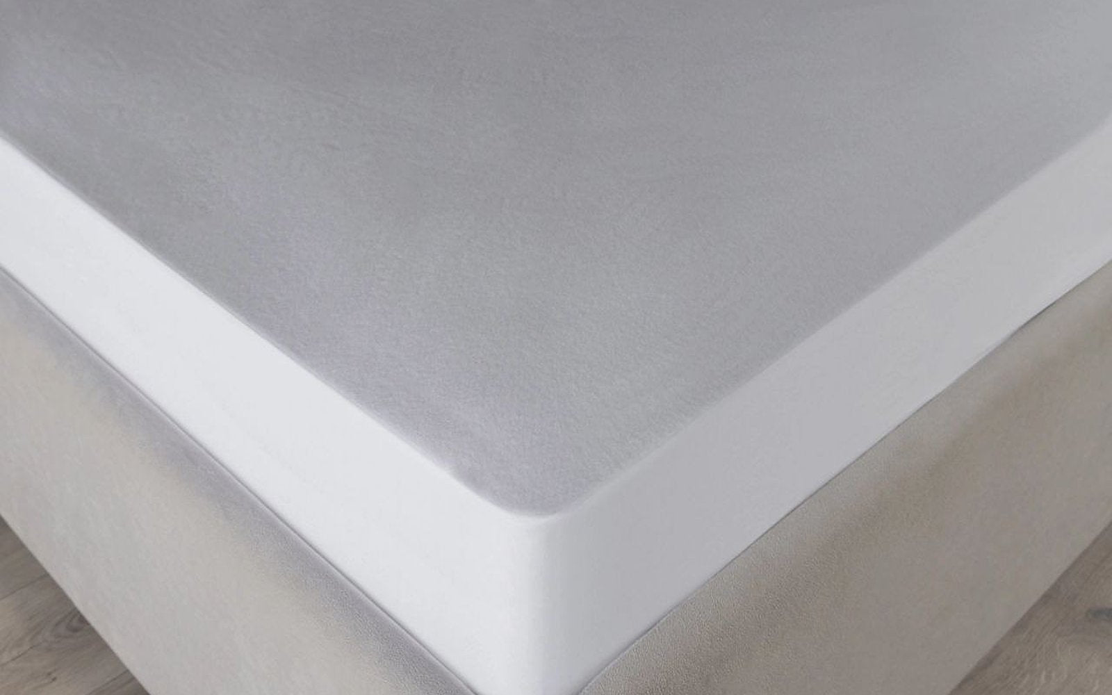 Simple mattress protector in a bedroom interior, view 3