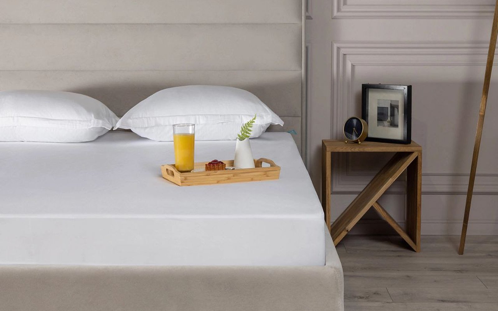 Simple mattress protector in a bedroom interior, view 4