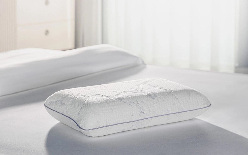 Alpha pillow in a bedroom interior
