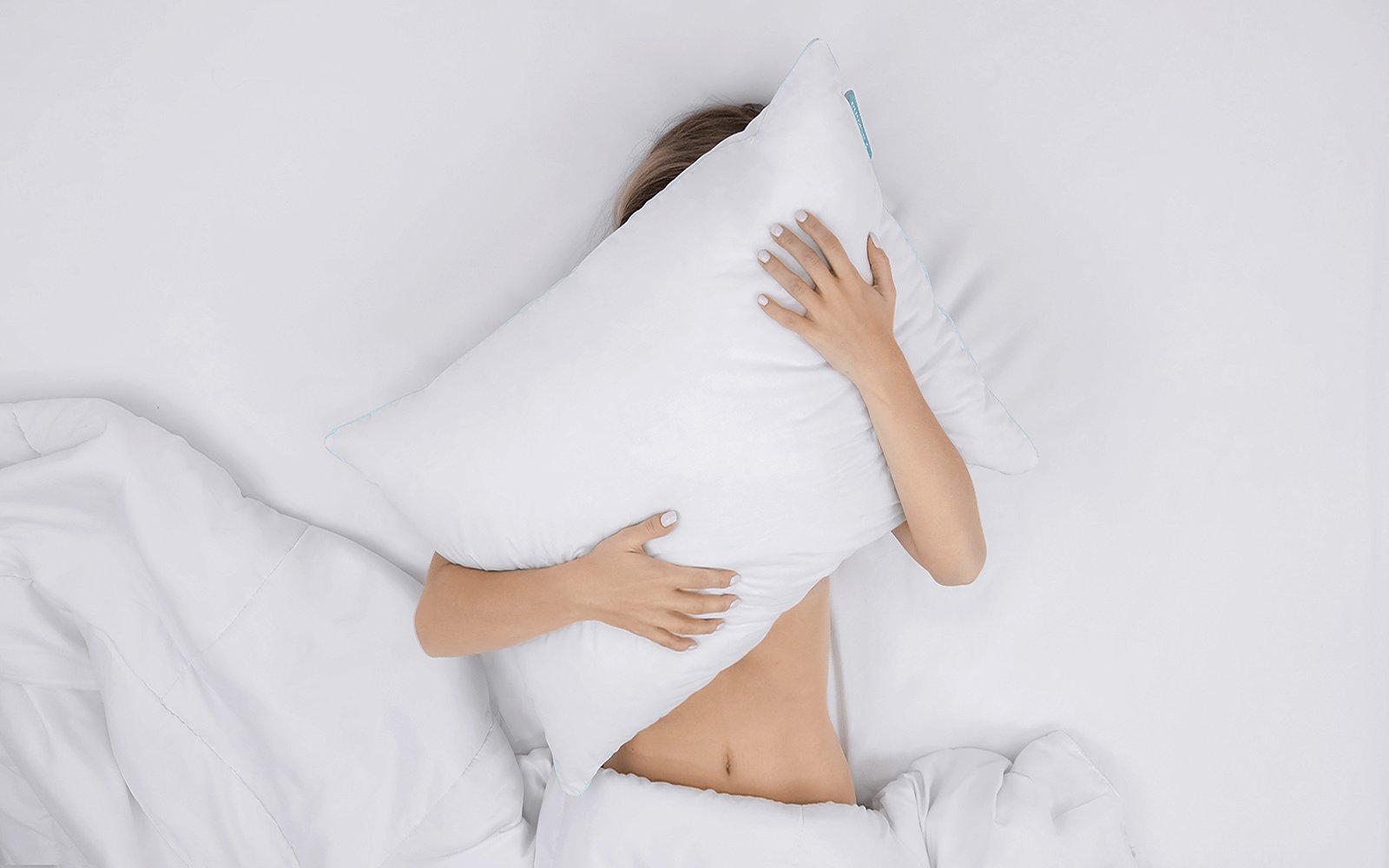 Balance pillow in a bedroom interior, view 1
