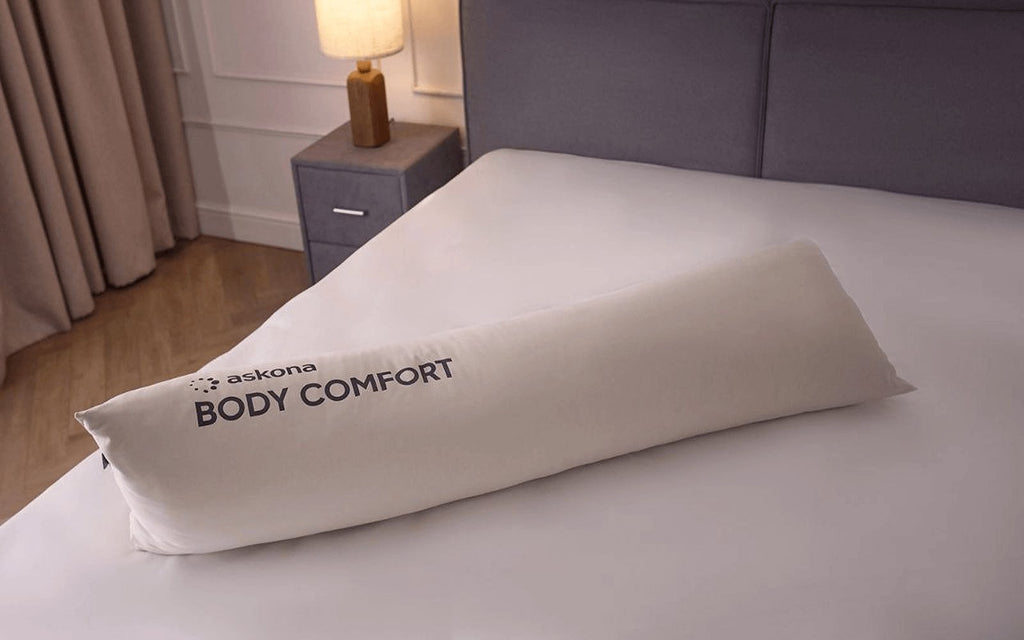 Body Comfort pillow in a bedroom interior, view 1