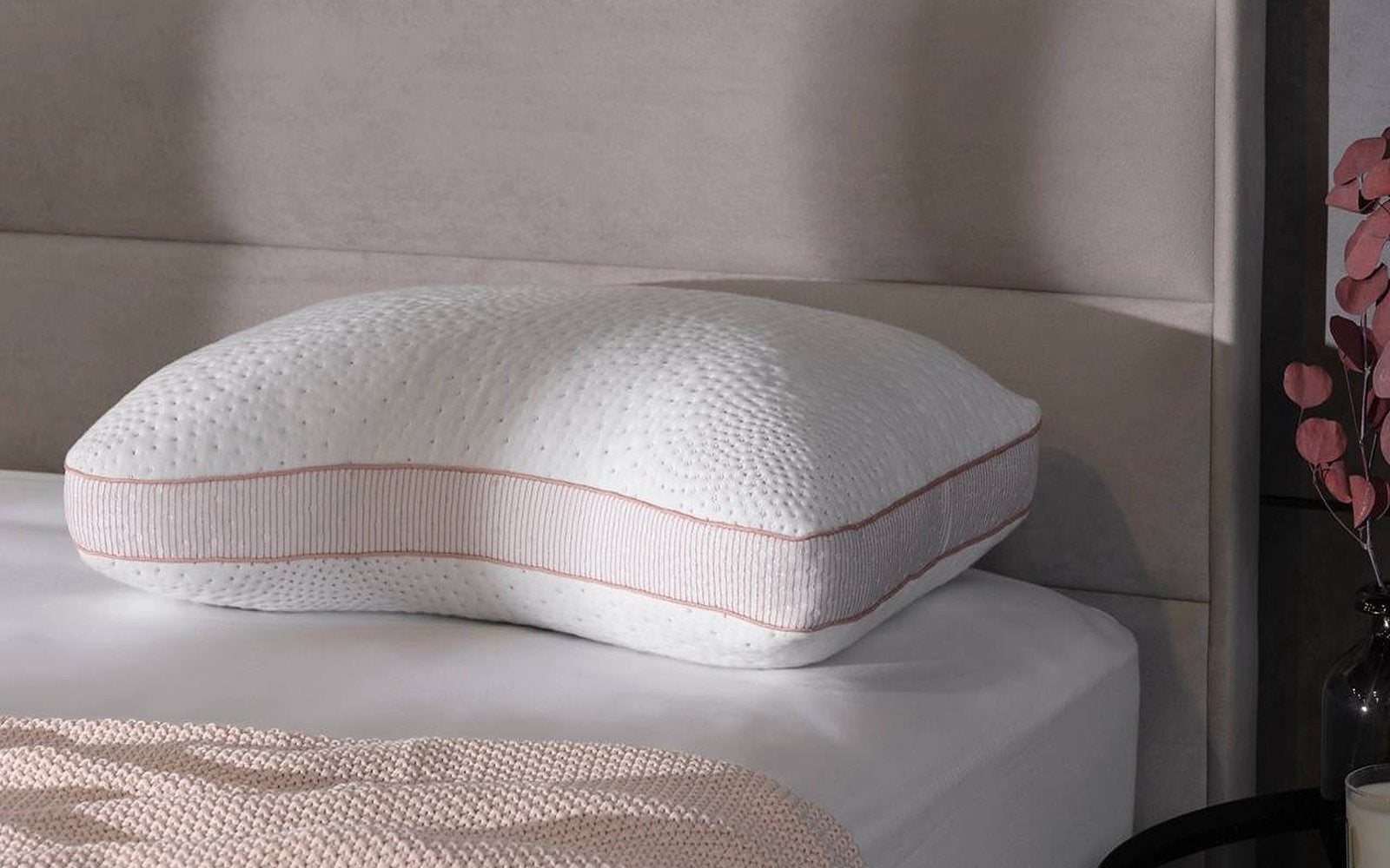 Grether & Wells Rose pillow in a bedroom interior, view 1