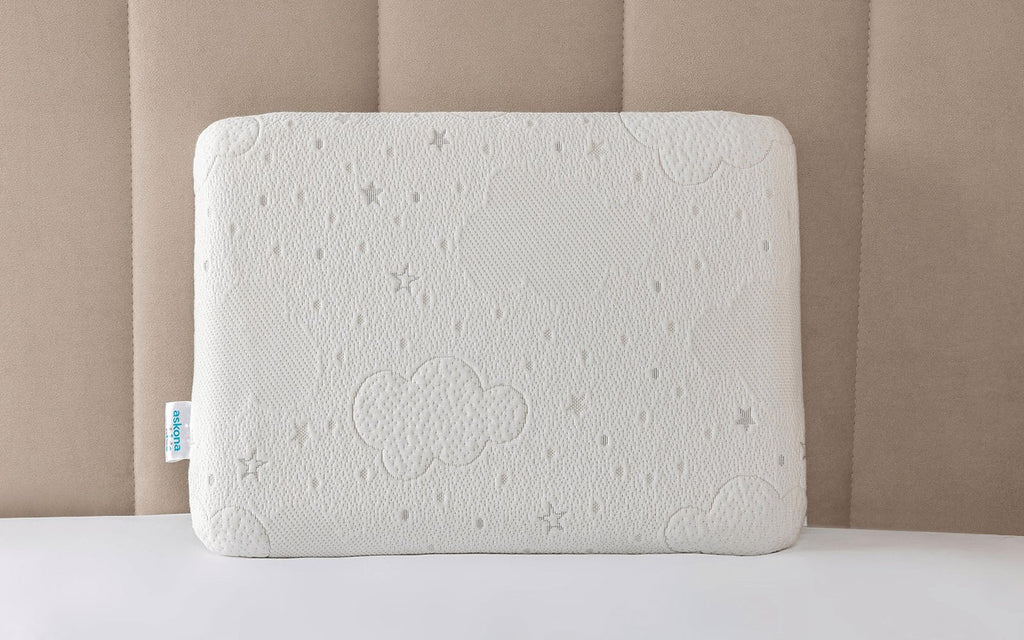 Navi pillow in a bedroom interior, view 1