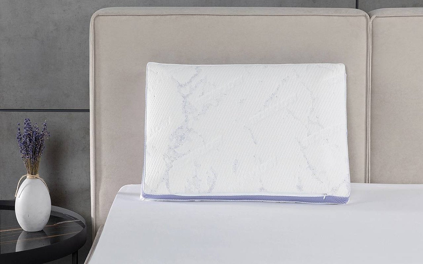 Omega pillow in a bedroom interior, view 1