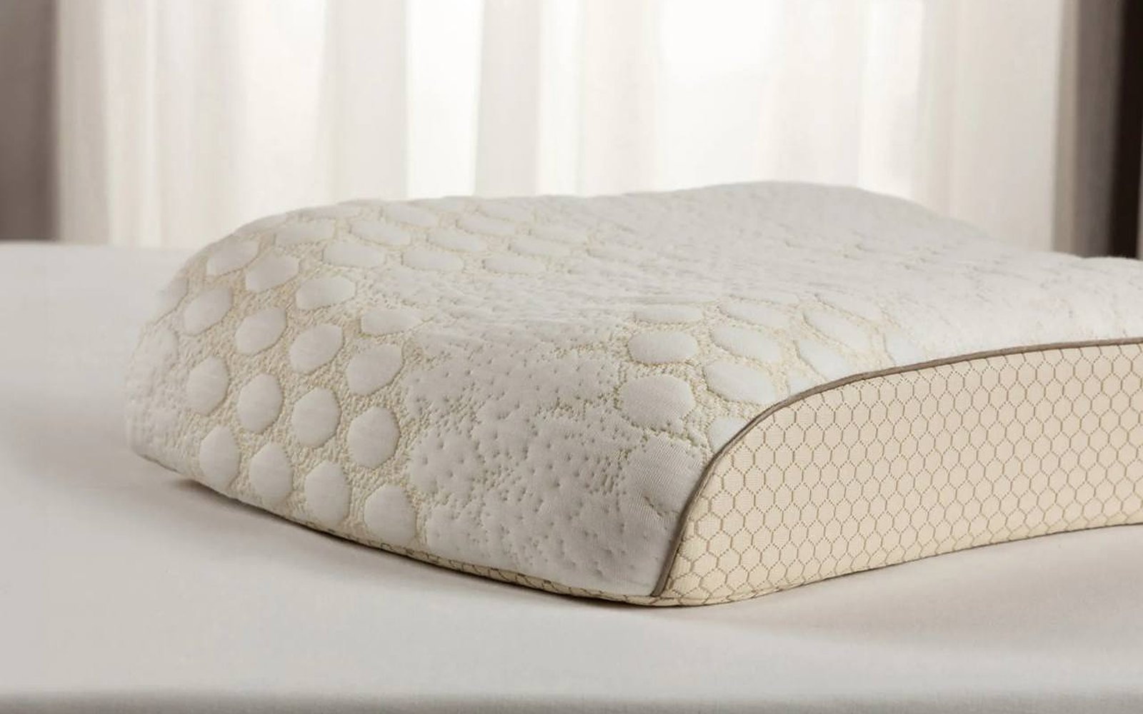 Ortho Contour pillow in a bedroom interior, view 1