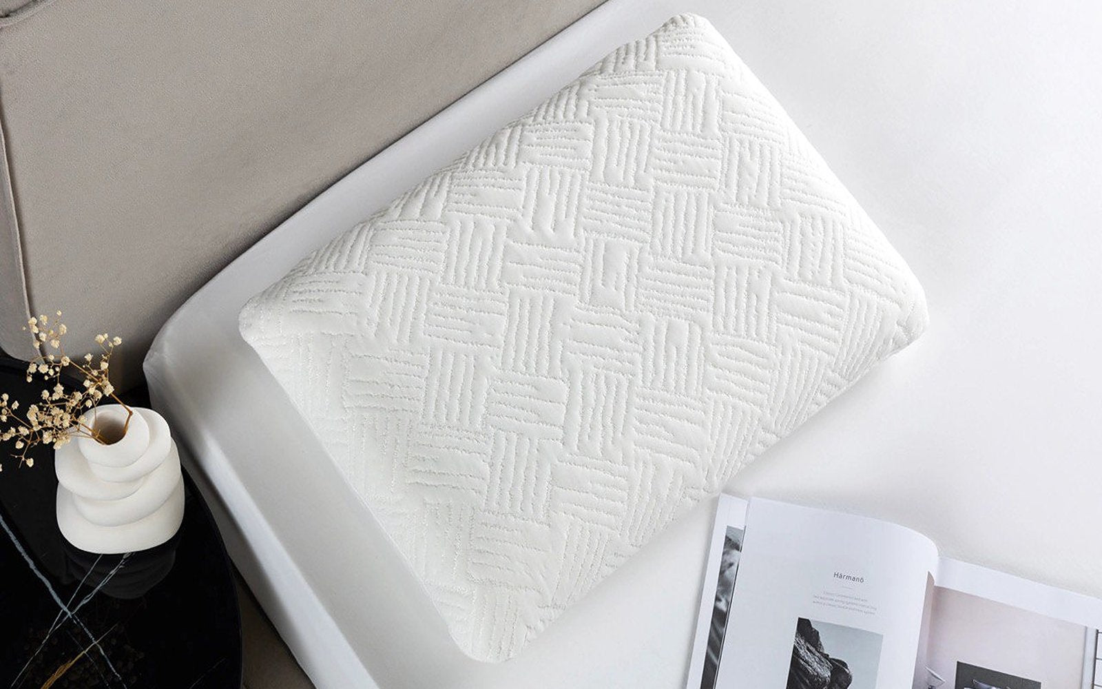 Pillo New pillow in a bedroom interior, view 1