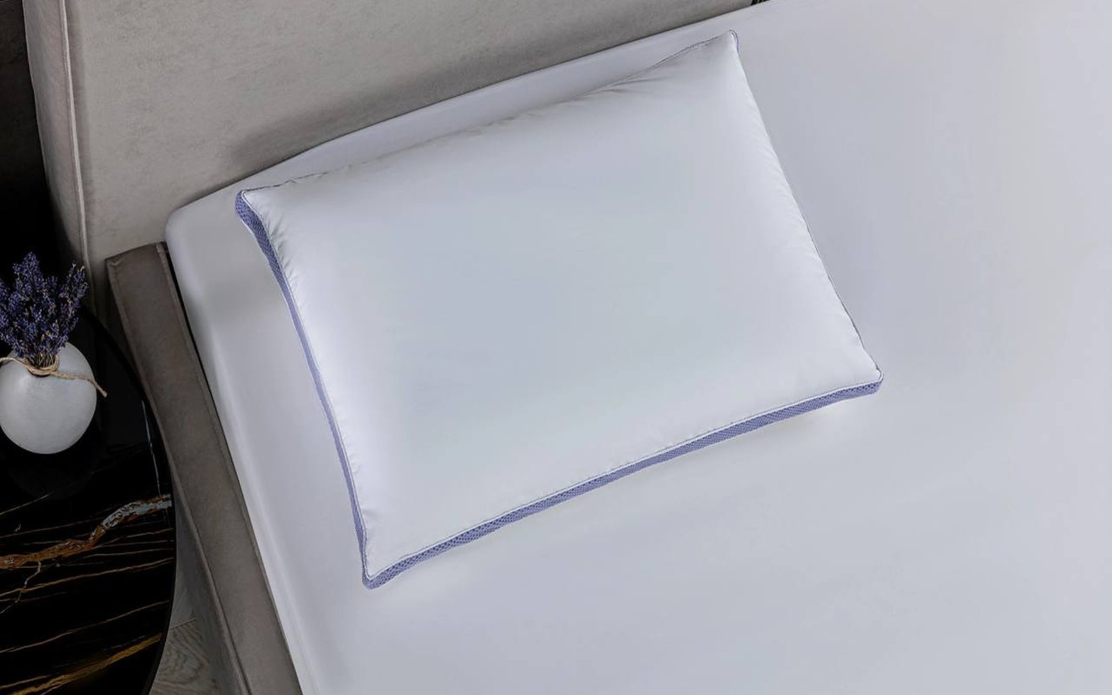 Sigma pillow in a bedroom interior