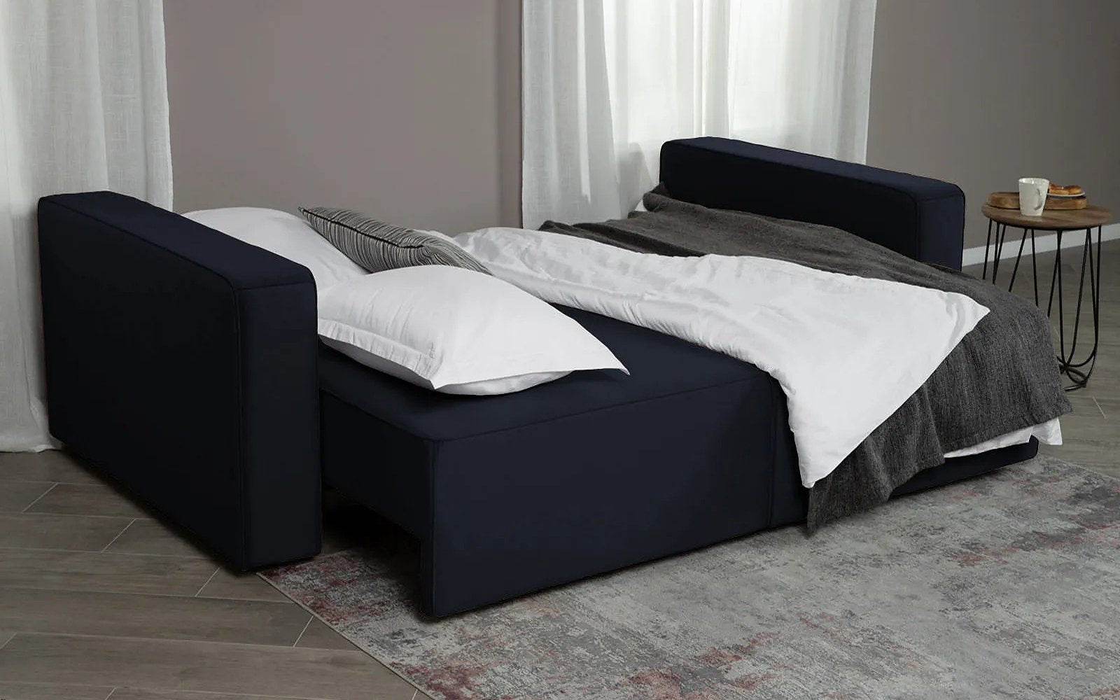 Ralf sofa bed in a living room interior, view 3